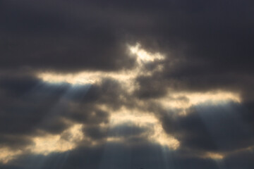 Wall Mural - storm cloud with bright skylights of sunlight