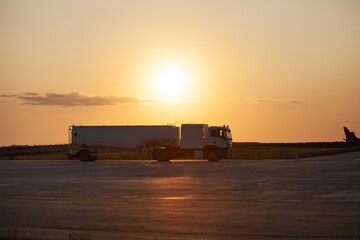 Wall Mural - View of the aircraft parking at the airport. The plane is being prepared for departure by airport staff.