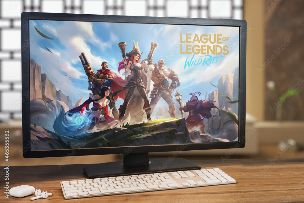 League of Legends Wild Rift game on computer screen. Monitor, keyboard ...