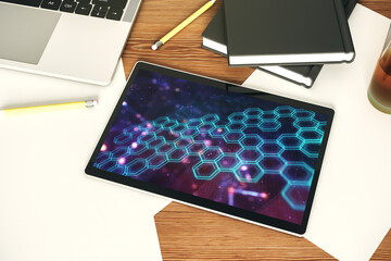 Poster - Top view of modern digital tablet monitor with technology hologram with hexagon. Research and development software concept. 3D Rendering