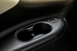 © Roman - Cup holders inside modern car interior. Interior view of modern car.