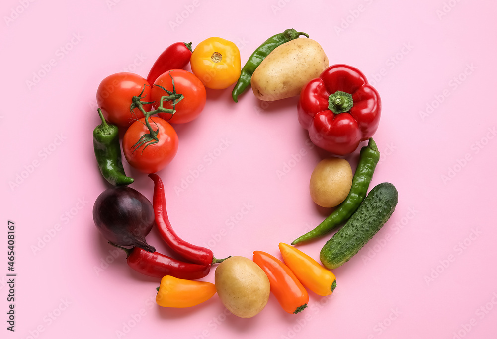 Frame made of different vegetables on color background. Vegan Day