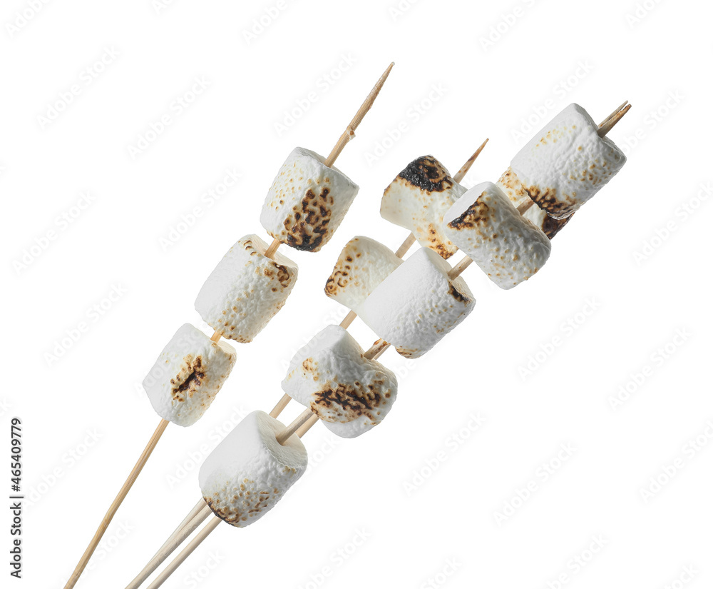 Skewers with sweet grilled marshmallow on white background, closeup