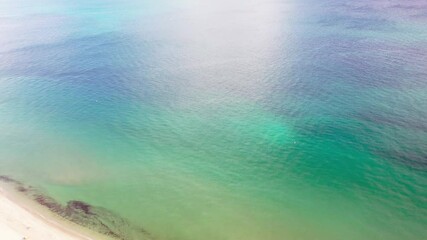 Fototapete - beach Flyover White Sand Emerald Water Glassy smooth Reflection