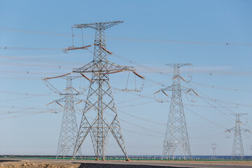 Poster - power transmission tower on solar farm