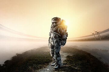 Wall Mural - astronaut walking on an unexplored planet