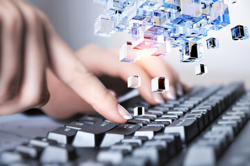 Wall Mural - Hands of a young woman on keyboard