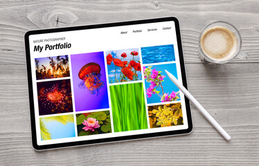 Wall Mural - Tablet computer with photography portfolio on the screen