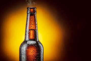 Wall Mural - Opened bottle of cold beer and gas output isolated on a yellow background.