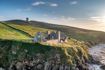 The remains of the 1790 to 1805 kelp factory Teach Dearg or the Red House at Crohy head near Maghery, Dunloe, County Donegal - Ireland