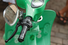 Clutch Handle On Green Motor Scooter Close Up
