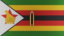 Top Down View Of A 9mm Bullet In The Center And On Top Of The Flag Of Zimbabwe