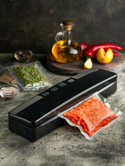 Wall Mural - Vacuum packing machine. For long-term storage of food. Top view dark background.