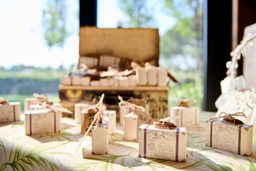 Poster - Beautiful wedding favors on a table in a decorated venue