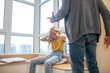 © zinkevych - A gray-haired man having a hard talk with his teenage daughter