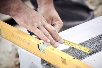 Poster - Construction worker working on a street reconstruction.