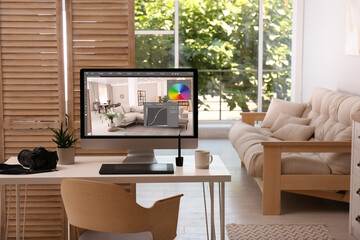 Poster - Retoucher's workplace. Computer with photo editor application, camera and graphic tablet on table in office