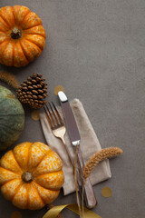 Wall Mural - Autumn place setting lifestyle thanksgiving background with cutlery and pumpkins