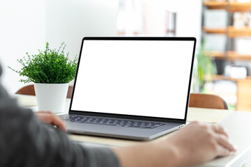 Poster - Man working on a laptop with a blank screen at his desk