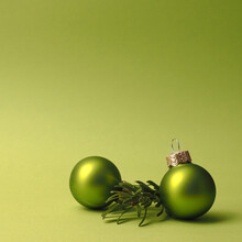 Green Vintage Christmas Baubles On A Green Background