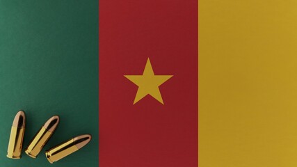 Three 9mm bullets in the bottom left corner on top of the national flag of Cameroon