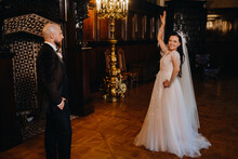 Elegant Wedding Couple In The Interior Of The Old Castle In The City Of Nesvizh