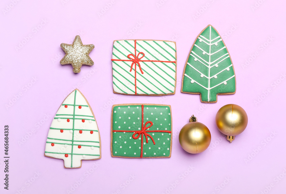 Delicious Christmas cookies with decor on color background