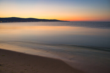 Wall Mural - red dawn over a calm sea off the Balkans