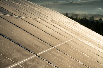 Wall Mural - photovoltaic panels on a mountain meadow in the autumn morning
