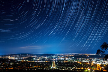 star trail over canberra city, act australia