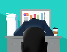 Overworked man slumped over desk