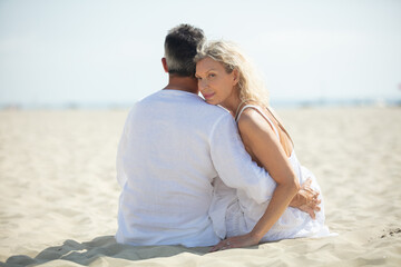 mid aged couple on the beach