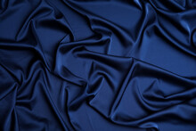 Crumpled Dark Blue Silk Fabric As Background, Top View