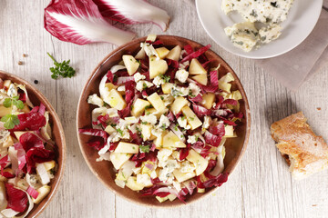 Wall Mural - chicory salad with apple,  blue cheese and walnut