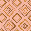 Geometric berber rug pattern repeat with hand drawn ethnic diamonds in blush pink, ochre and brown over textured background. Seamless vector illustration print design. Great for home wear, carpets and