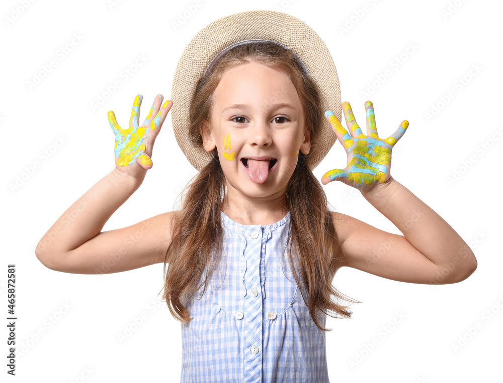 Little girl with palms in yellow and blue paint on white background
