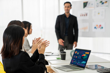 Poster - businesswoman in business meeting using laptop computer proficiently at office for marketing data an