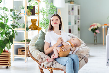 Wall Mural - Portrait of attractive dreamy sweet girl mommy holding baby day dream sleep nap slumber at light home flat indoors