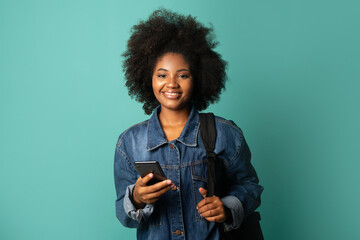 Wall Mural - beautiful young woman tourist with mobile phone 