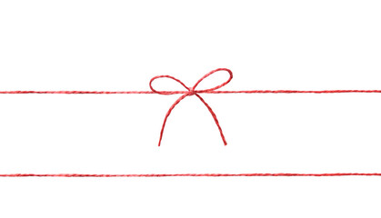 Wall Mural - String twine rope red color with bow isolated on white.Thread,fiber.