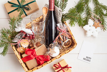 Refined Christmas Gift Basket For Culinary Enthusiats With Bottle Of Wine And Mulled Wine Ingredients. Corporate Hamper Or Personal Present For Cooking Lovers, Foodies And Gourmands.