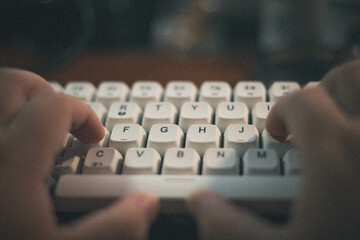 Canvas Print - Closeup of a person typing on a keyboard