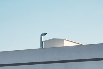 Poster - Urban architecture. Close up of an office building rooftop.