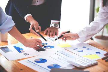 Team work with business analytic price chart on the table at the conference room.