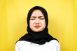 © MunirSr - Closeup of beautiful young muslim woman sad, sullen, unhappy, isolated