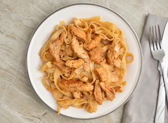 Poster - Chicken and Alfredo Fettuccine on a plate