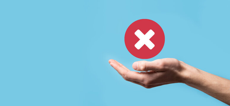 Hand holds icon,cancellation symbol,cancel icon.Cross mark flat red icon.round X mark.cancel button.Wrong.cross mark rejection.Declined.On dark background.Banner.Copy space.Place for text.