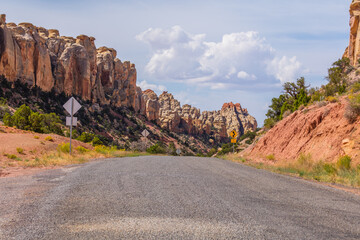 Wall Mural - Road to the canyon. Amazing rock landscape. Orange rock slopes. Scenic view of the canyon. Beautiful view of the Burr trail road, Utah, USA