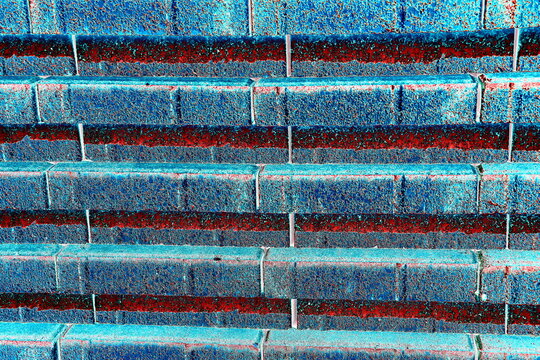 Abstraction, construction sand, changed colors, background in muted tones