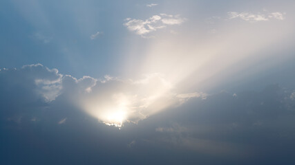 Wall Mural - Wonderful view of cumulus clouds sky with sun light. Daylight yellow sunshine